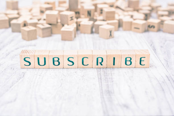 istock The Word Subscribe Formed By Wooden Blocks On A White Table, Reminder Concept 1017183924