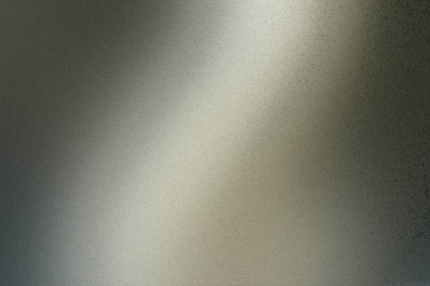 istock Texture of brushed dark green steel with light reflection, abstract background 1017184046