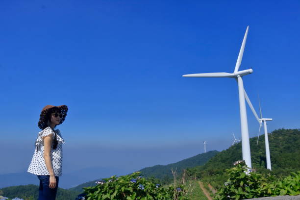 A windmill and woman