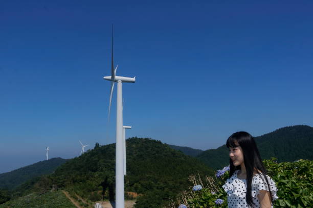 A windmill and woman