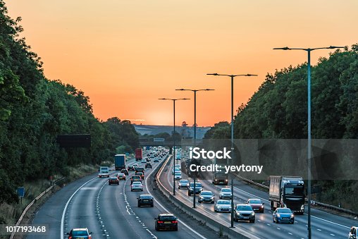 istock Sunset view of busy UK Motorway traffic in England 1017193468