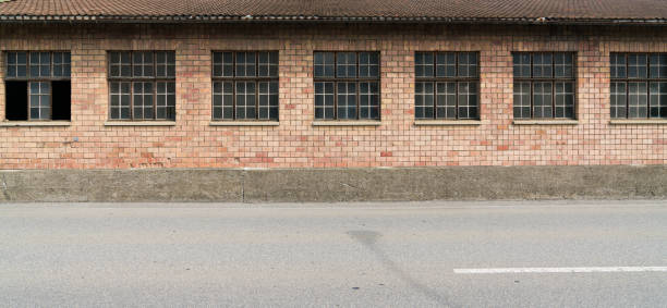 istock red brick industrial building with large windows 1017207750