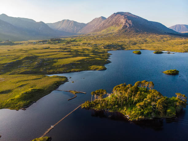 istock Twelve Pines Island, standing on a gorgeous background formed by the sharp peaks of a mountain range called Twelve Bens, County Galway, Ireland 1017210330