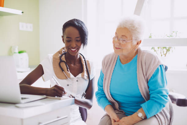 istock Doctor is writing a prescription in her office 1017212362