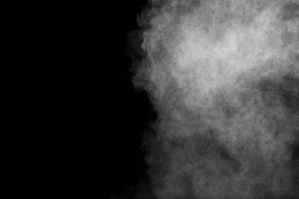 istock Bizarre forms of white powder explosion cloud against black background. 1017212698