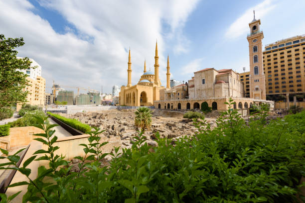 Cathedral and Mosque in Beirut, Lebanon Saint George Maronite Cathedral and Mohammad Al Amine blue Mosque across roman ruins in downtown Beirut, Lebanon. lebanon beirut stock pictures, royalty-free photos & images