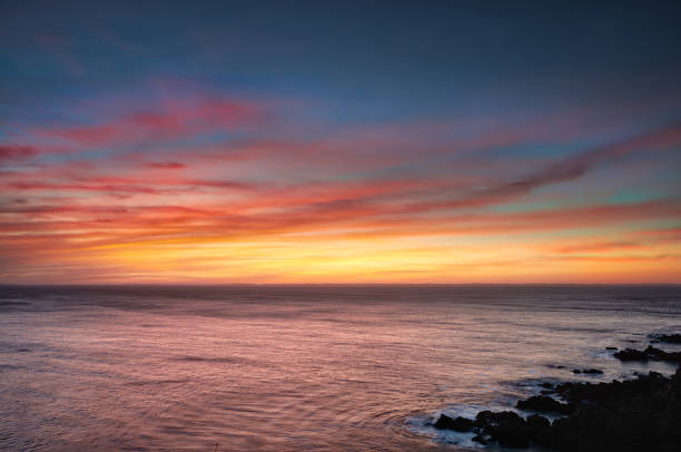 istock Sunset over edge of island 1017220046