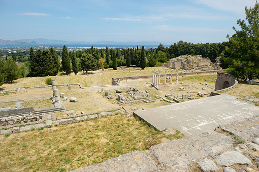 In the foreground is the Temple of Artemis near the ancient city of Selçuk Ephesus, in the middle is the İsa Bey Mosque and St. Jean Church, Selcuk Castle in the distance