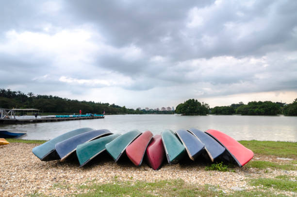 istock kayaks on the shore of the lake with dramatic clouds 1017230152