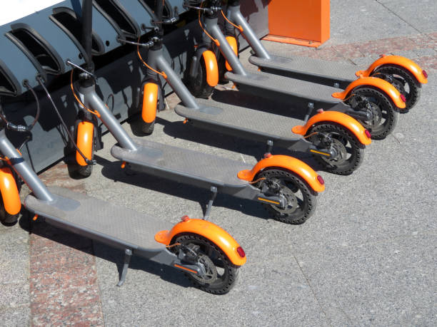 istock Electric scooters in row on the parking lot 1017230382