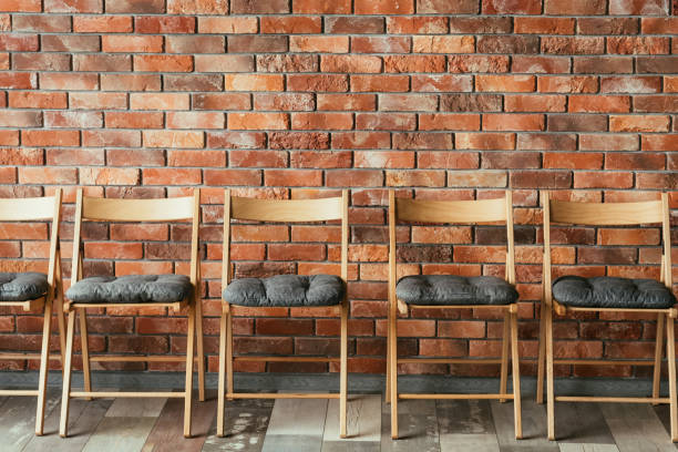istock empty chair vacant seat loft waiting job interview 1017230860