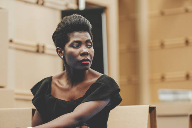 istock African businesswoman, sitting, resting 1017231168