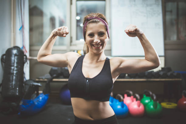 istock Showing muscles in a gym 1017243534