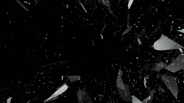 istock Pieces of splitted or broken glass on black 1017275864