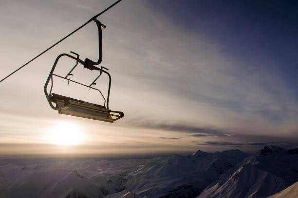 istock Empty cable car on the background of the sky and mountains 1017278588