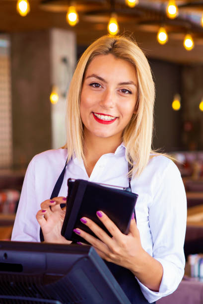 istock Waitress at a coffee shop 1017287702