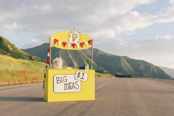 Big Ideas Lemonade Stand One and all come by the Big Ideas Lemonade Stand for innovative and fresh ideas located on a rural road in the mountains of Utah. For just one dollar, any businessperson would take advantage of such a sale. These bright ideas can brighten and enlighten any business owner who is looking to break new ground for their company. images of lemonade stands stock pictures, royalty-free photos & images