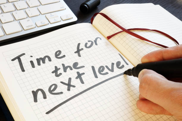 istock Man is writing time for the next level. Motivation. 1017300592