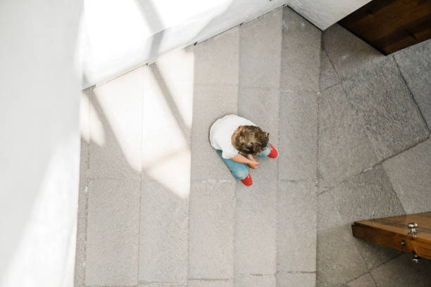 Child sitting on stairs