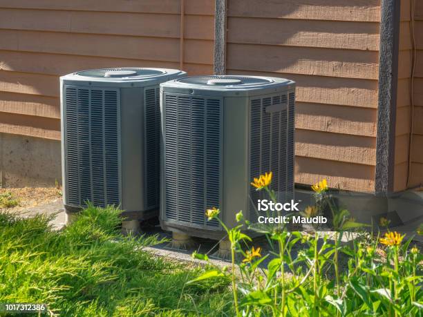 Air Conditioning Units Outside An Apartment Complex Stock Photo - Download Image Now