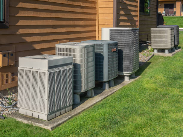 istock Air conditioning units outside an apartment complex 1017312428