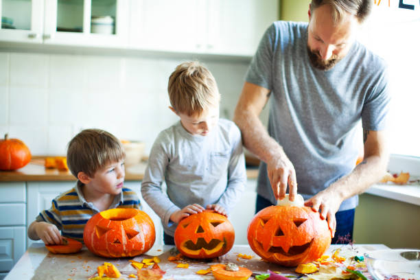 Getting ready for Halloween Getting ready for Halloween carving craft activity stock pictures, royalty-free photos & images