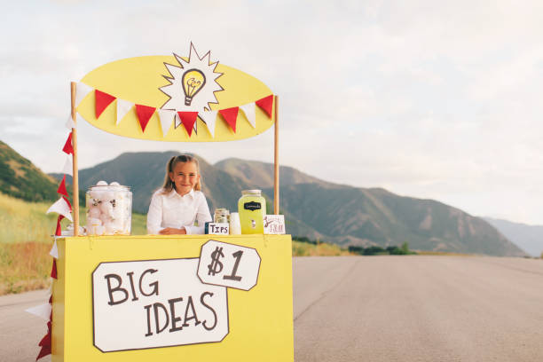 istock Young Business Girl Runs Big Idea Stand 1017316994