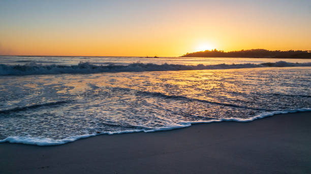 istock Ocean Water Rushing Toward the Camera During Sunset 1017321294