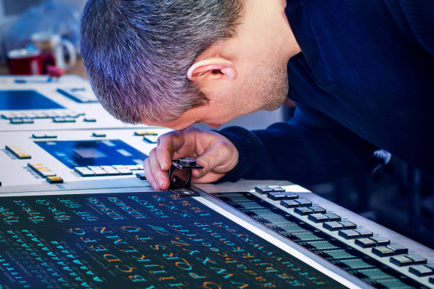 istock Man in the process of offset printing and color correction 1017328546