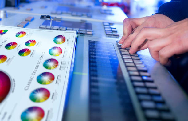istock Man in the process of offset printing and color correction 1017328590