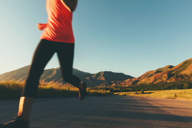 Shot of a sporty young woman out for a run in the city