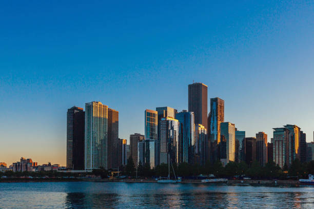 istock Chicago Skyline by Lake Michigan at Sunset 1017384686