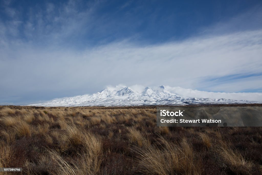 Volcanic mountain peak covered in snow Majestic beauty in nature American Culture Stock Photo