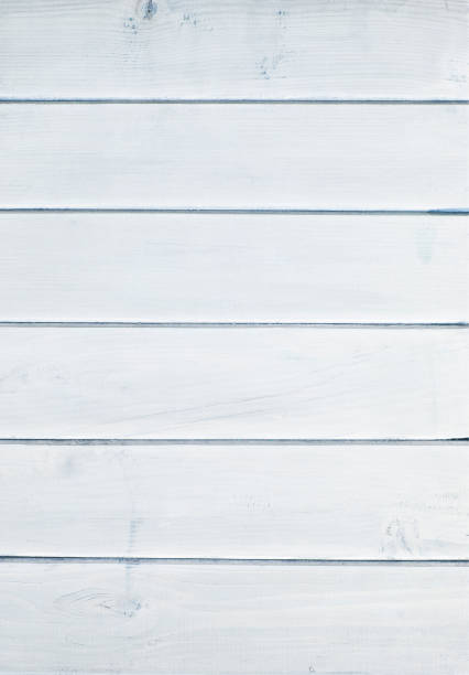 istock Background of white, peeling paint on an old wall 1017408012