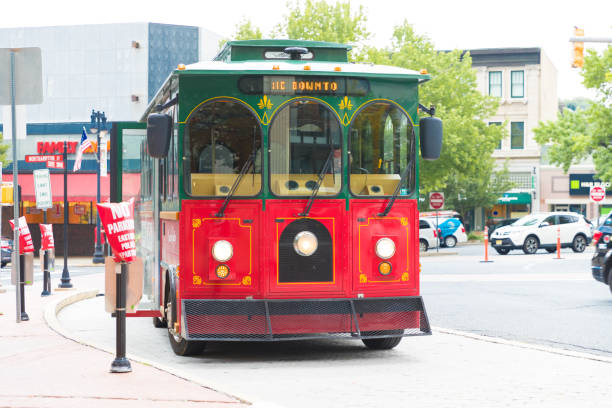 March 19, 2019 San Diego / CA / USA - Hop on / Hop Off trolleybus taking people on a city tour of San Diego