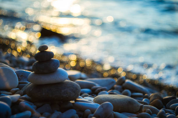 istock stack of zen stones on pebble beach 1017441066