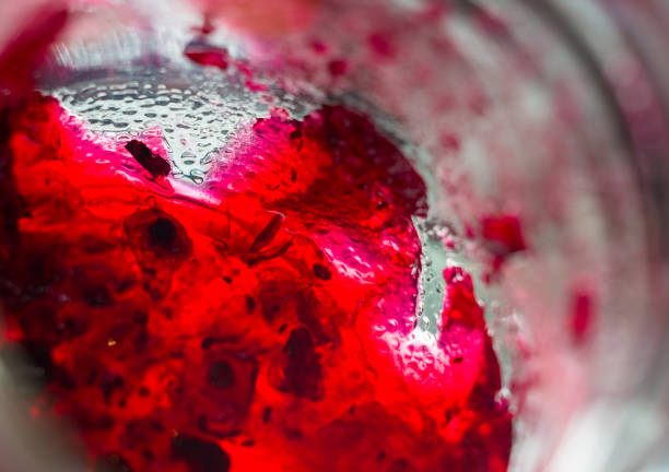 istock Bright translucent red currant jam in a glass jar 1017453326