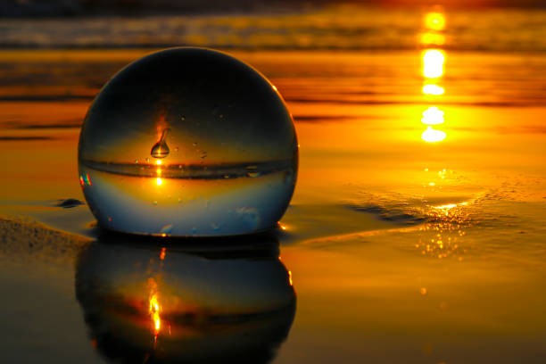 Crystal Ball Sunset On The Beach stock photo