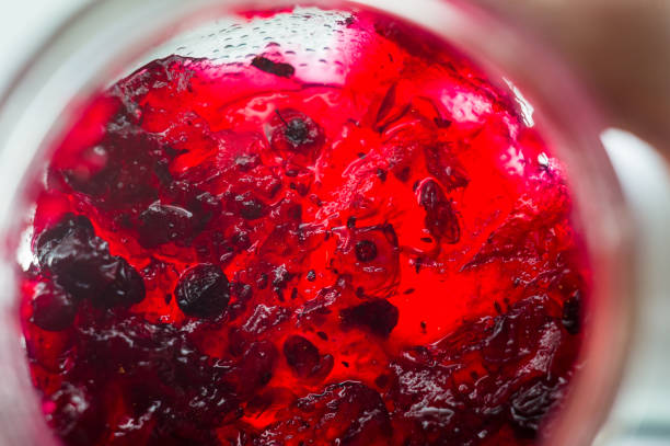 istock Bright translucent red currant jam in a glass jar 1017460222