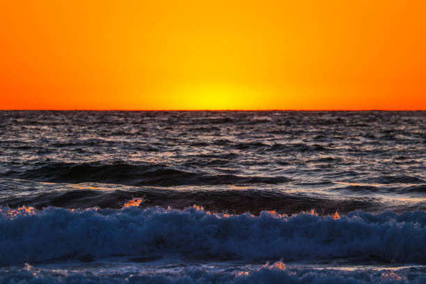 Splashing Fiery Sunset Waves