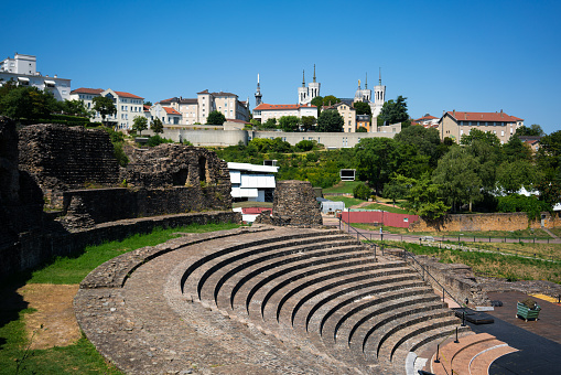 The Ancient roman theatre of Fourviere and the Basilica of Notre-Dame de Fourviere in background in Lyon france