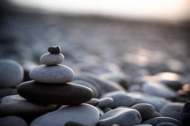 istock stack of zen stones on pebble beach 1017476122