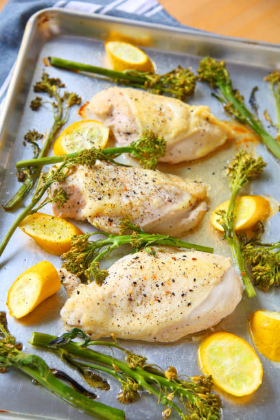 istock Overhead chicken sheet pan meal with broccolini 1017487006