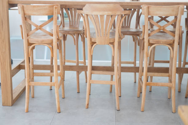 istock Wood long chairs arranged front coffee shop 1017489752