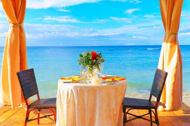 istock Romanticism: table for two and Beach with gazebo – Montego Bay - Jamaica 1017501562