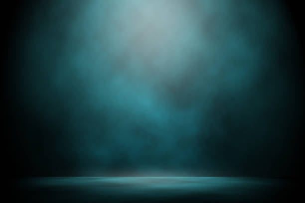 istock Blue spotlight smoke show stage night entertainment background. 1017501872