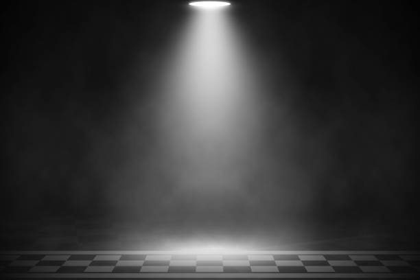 istock White spotlight on finish line of racing road texture background. 1017501982