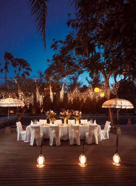 istock Wedding Banquet or gala dinner decorated with garlands. Festive table set up decor for wedding, party or event 1017526660