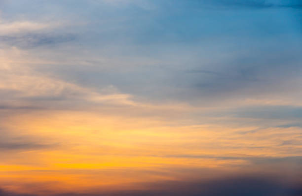 Orange,blue and beautiful gradient sunset sky stock photo