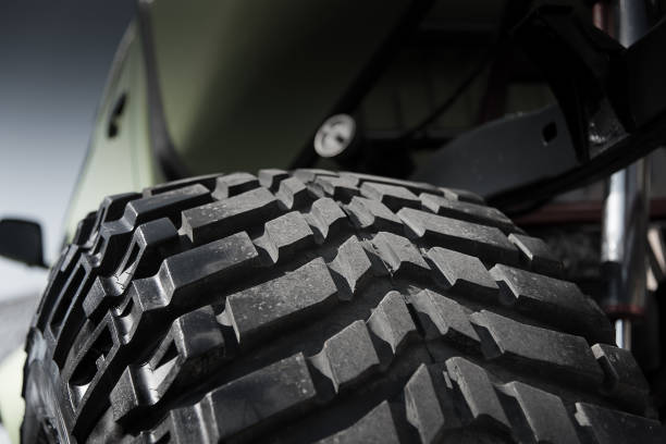 Close up off tire track 4x4 off raod car in dark concept stock photo